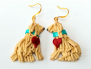 Could these be ANY cuter? We think not! Learn how to make your own pair of polymer clay dog earrings!