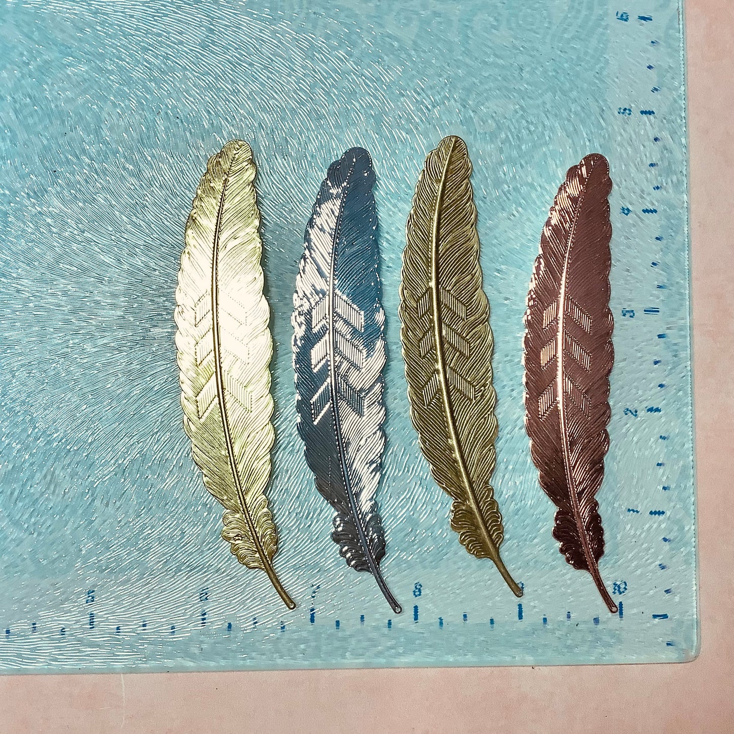 Feather Deco embossed metal bookmark