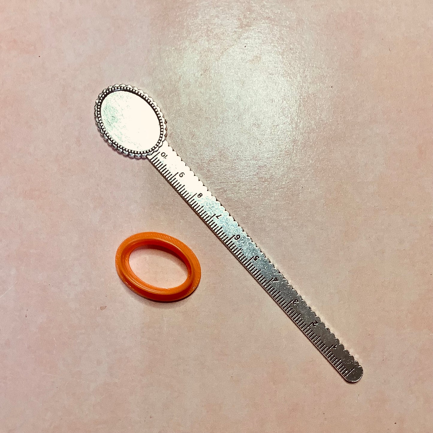 Metal bookmark with cabochon inset and ruler