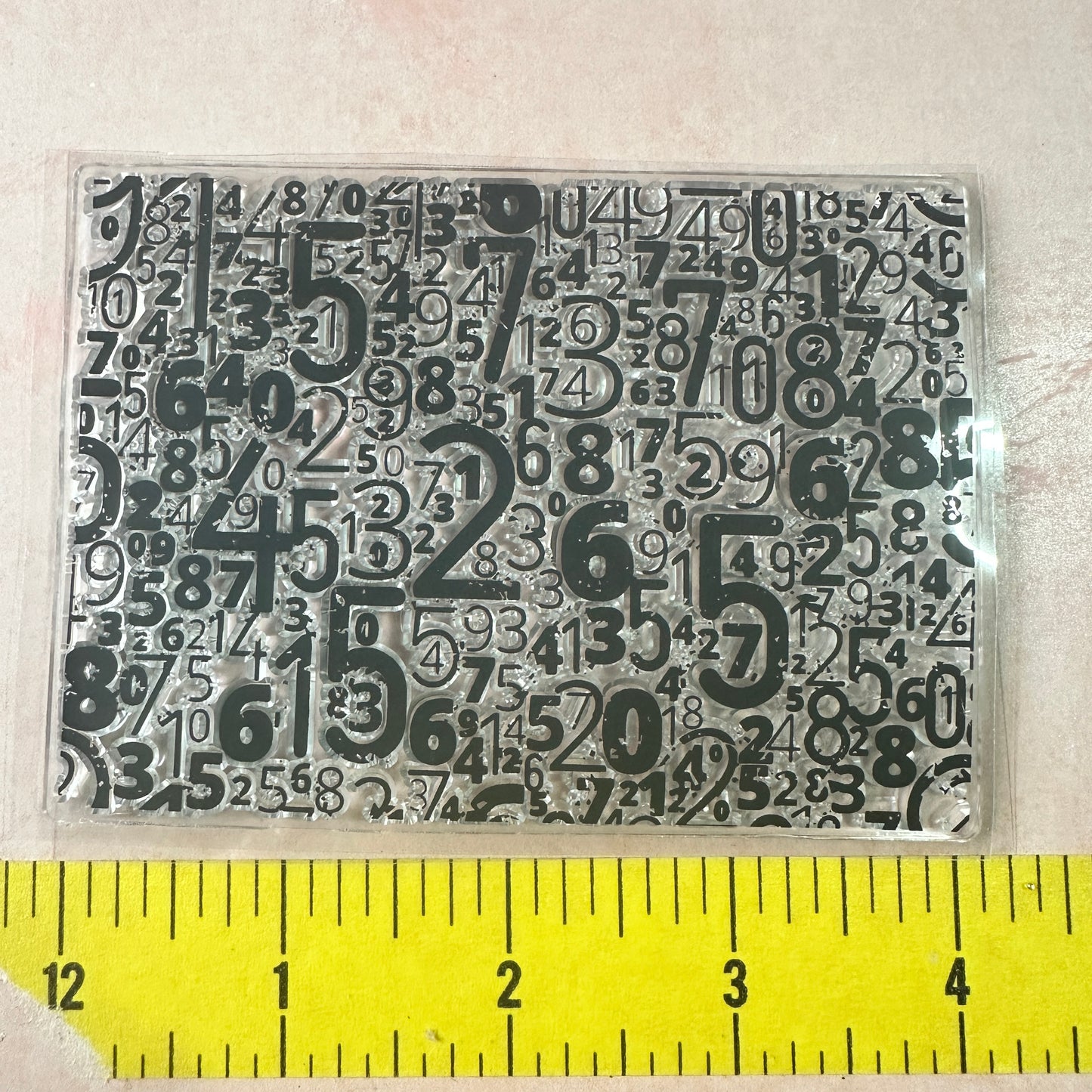 Numbers numerical grunge background clear clay and paper rubber stamp