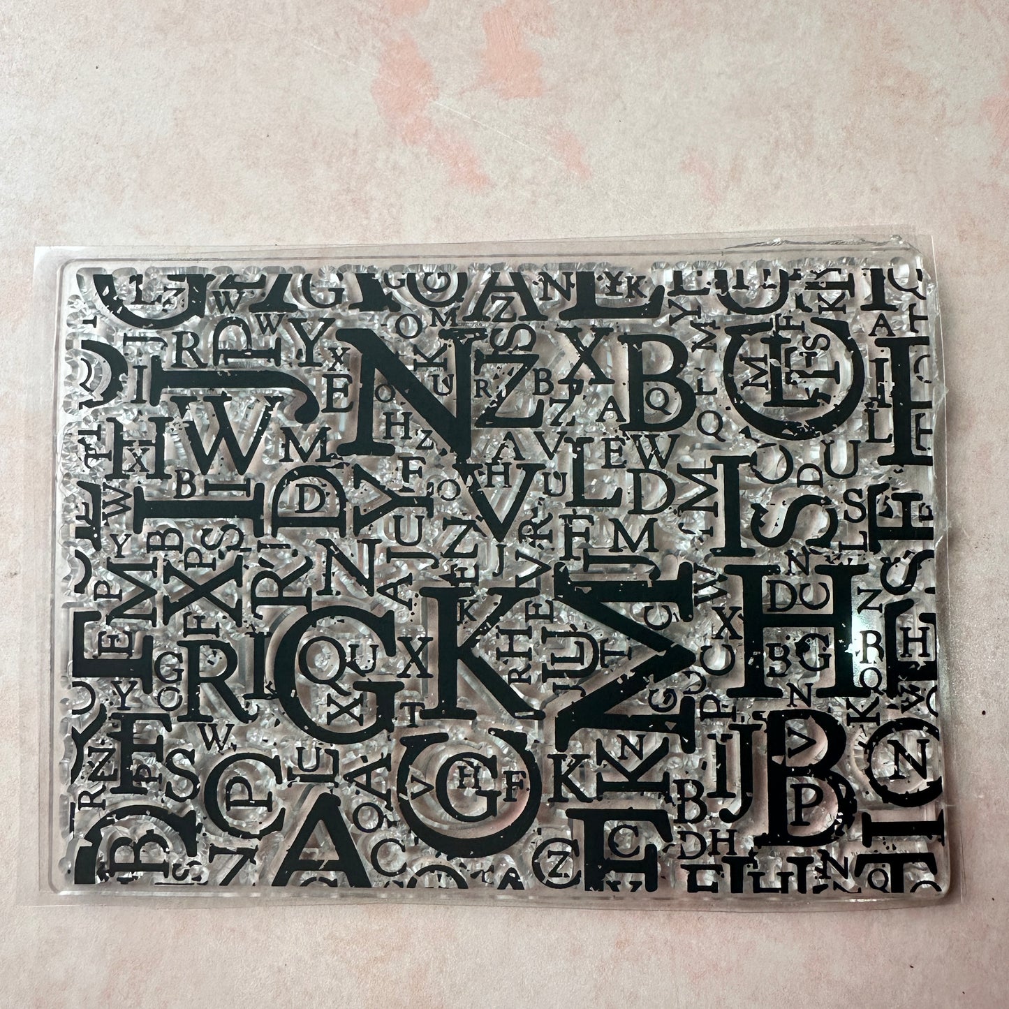 Letters grunge background clear clay and paper rubber stamp