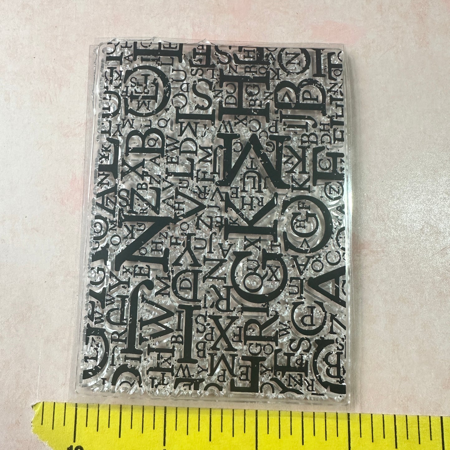 Letters grunge background clear clay and paper rubber stamp