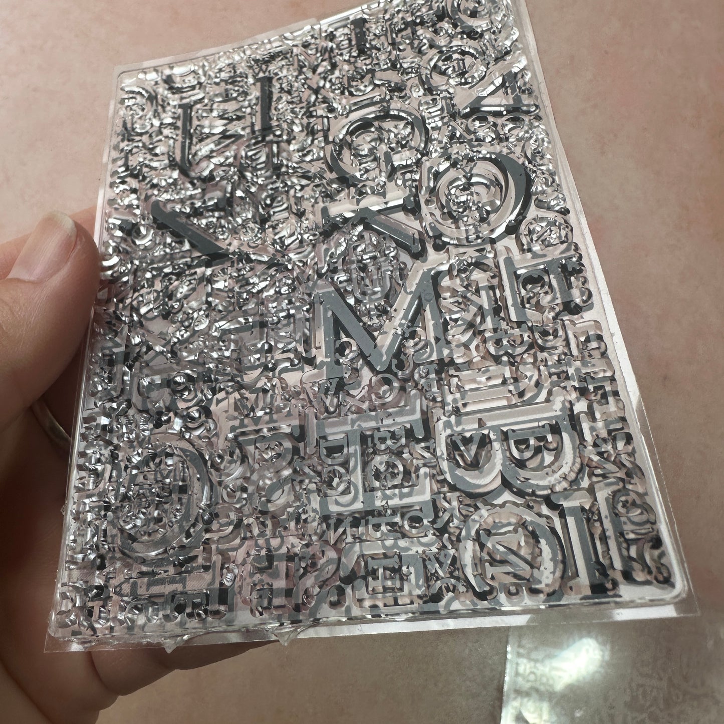 Letters grunge background clear clay and paper rubber stamp