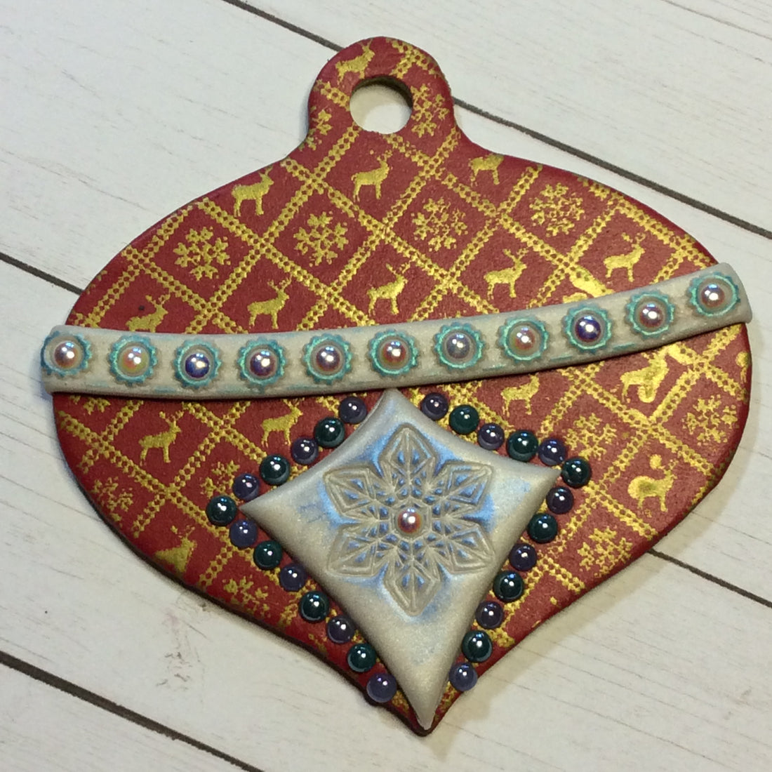 Create a silkscreend wood gift tag or holiday ornament with polymer clay