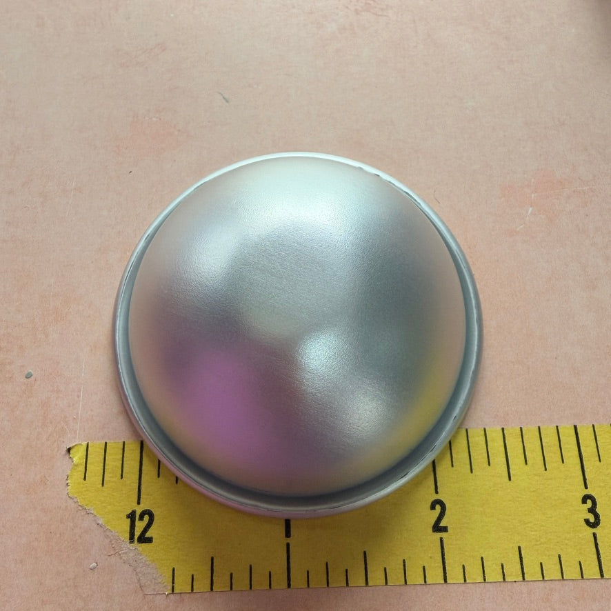 Little Luna Dome aluminum baking form next to ruler showing 2 inch size for polymer clay