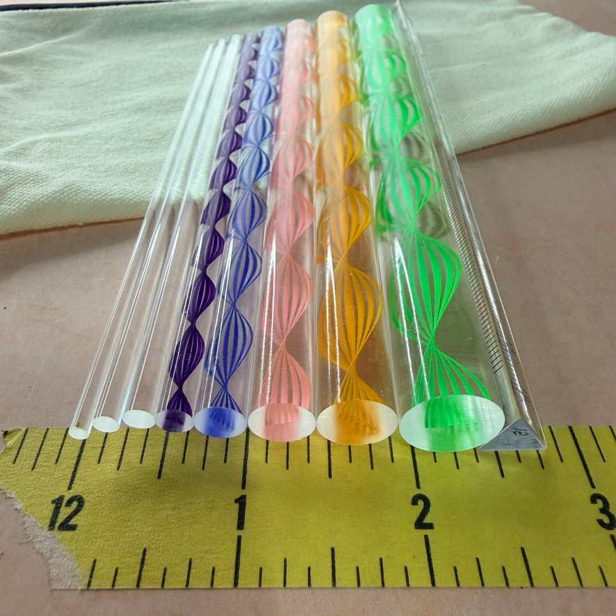 Dotting and Pressing Set for polymer clay close up showing colorful acrylic rod ends with spiral and lantern inlay patterns