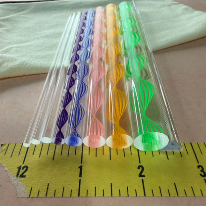 Dotting and Pressing Set for polymer clay close up showing colorful acrylic rod ends with spiral and lantern inlay patterns