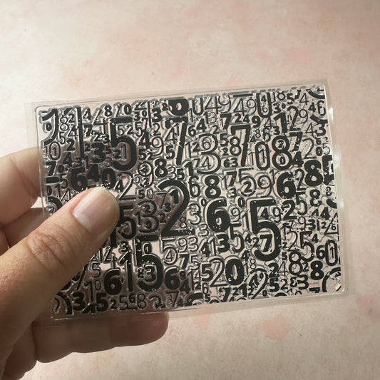 Numbers numerical grunge background clear clay and paper rubber stamp