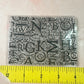 Letters grunge background clear clay and paper rubber stamp